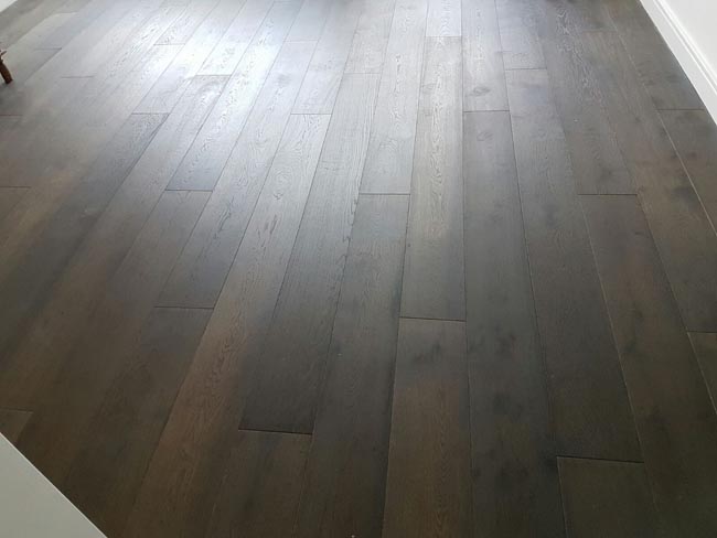 portfolio hardwood flooring dark wood room 04