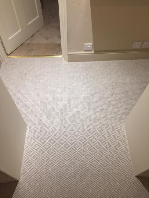 portfolio-grey-herringbone-carpet-with-black-binding-05