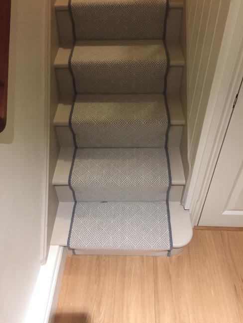 portfolio-grey-herringbone-carpet-with-black-binding-14