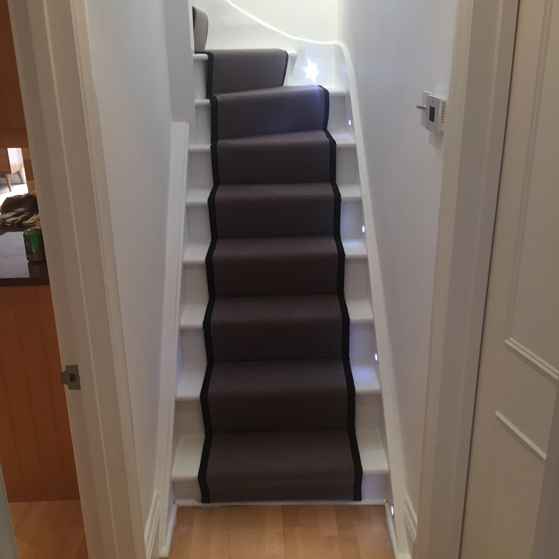 Grey Stair Runner With Black Binding On The Sides