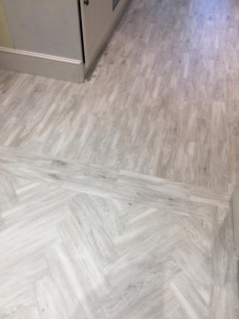 portfolio smooth floors amtico herringbone light grey wood 01