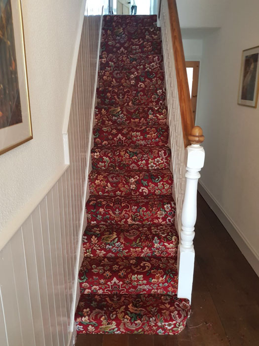 portfolio patterned red stair carpet 01