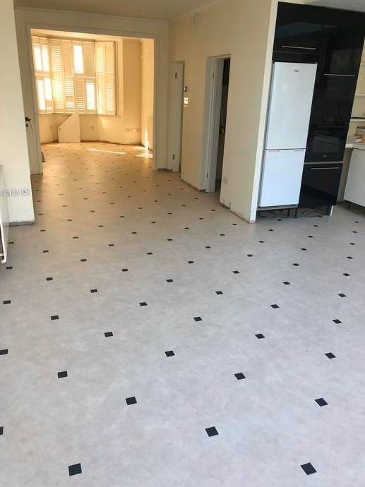 Amtico Signature Limestone Calico Luxury Vinyl Tile with Graphite Slate Key Installed in Westminster 1