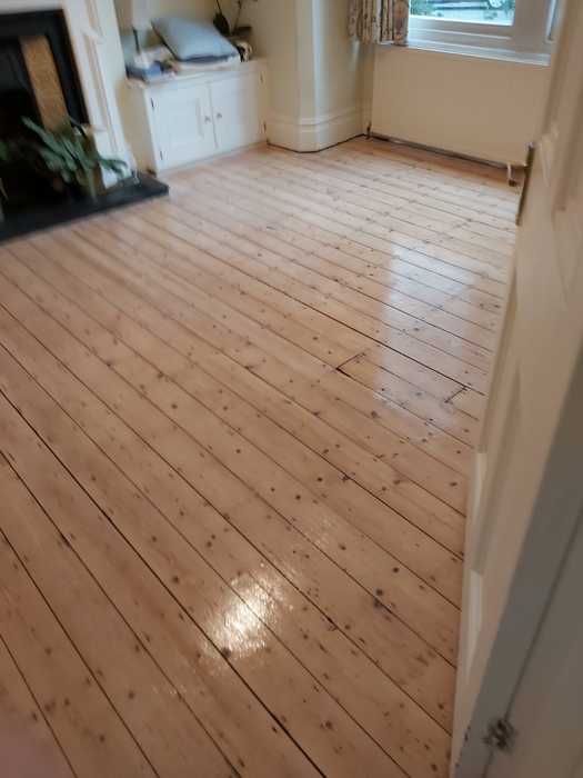 Sand and Seal Selected Areas of Wood Flooring Installed in Barnes 2