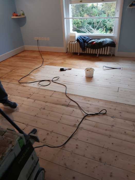 Sand and Seal Selected Areas of Wood Flooring Installed in Barnes 3