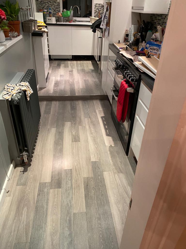 Install Amtico Spacia Sash Oak luxury vinyl flooring to premises in Clapham