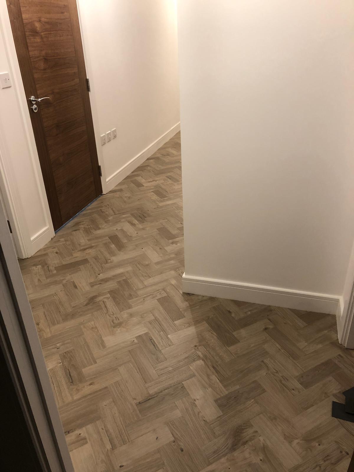 To supply & install Amtico Spacia Sun Bleached Oak luxury vinyl flooring in Kilburn 1