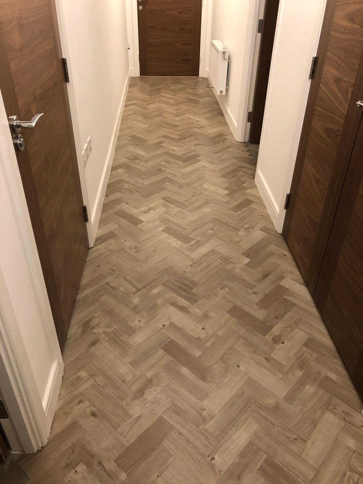 To supply & install Amtico Spacia Sun Bleached Oak luxury vinyl flooring in Kilburn 9