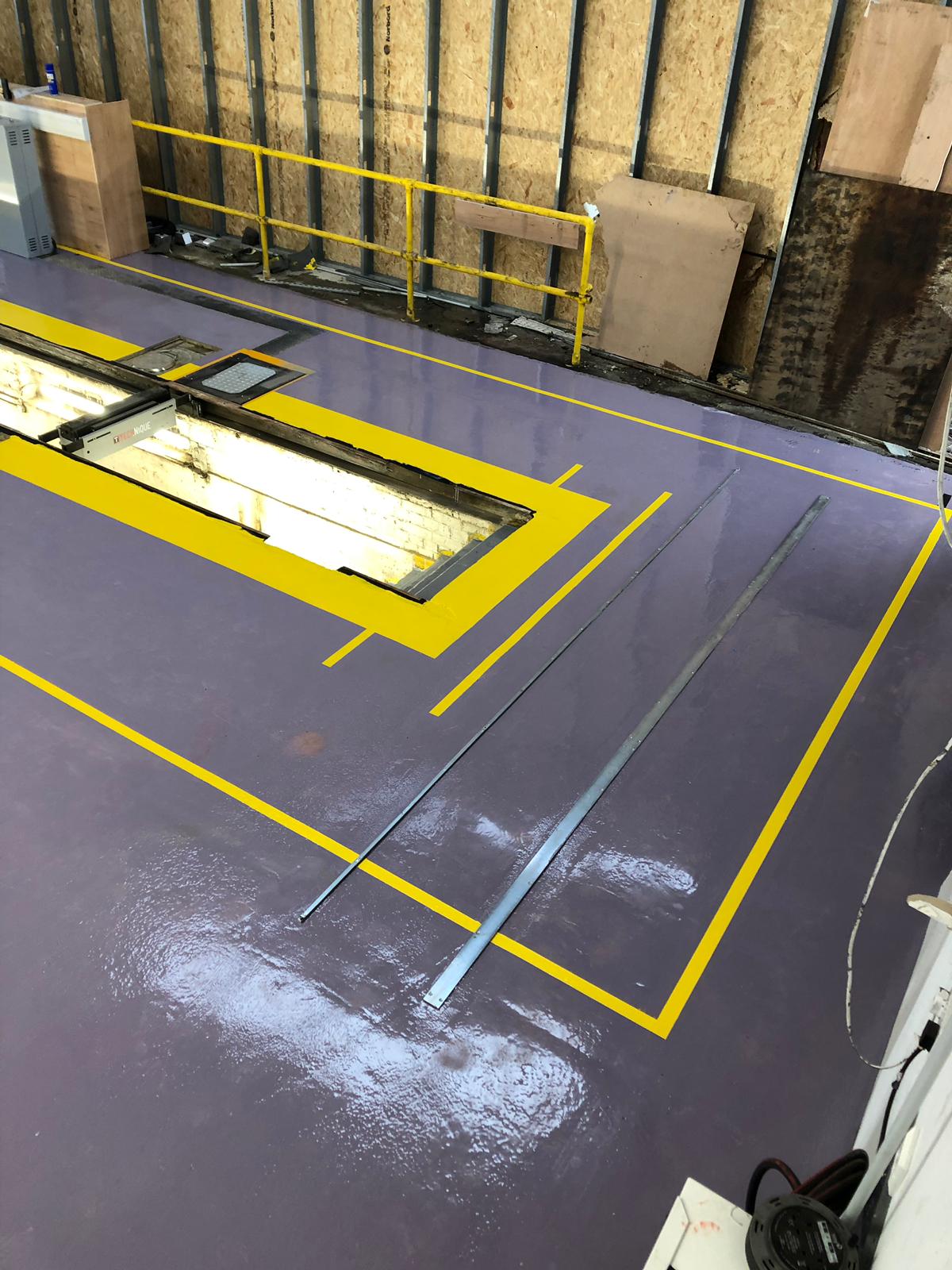 Vanguard Contracts to carry out the refurbishment of a 1200m2 Multi brand workshop floor at F G Barnes Guildford 3