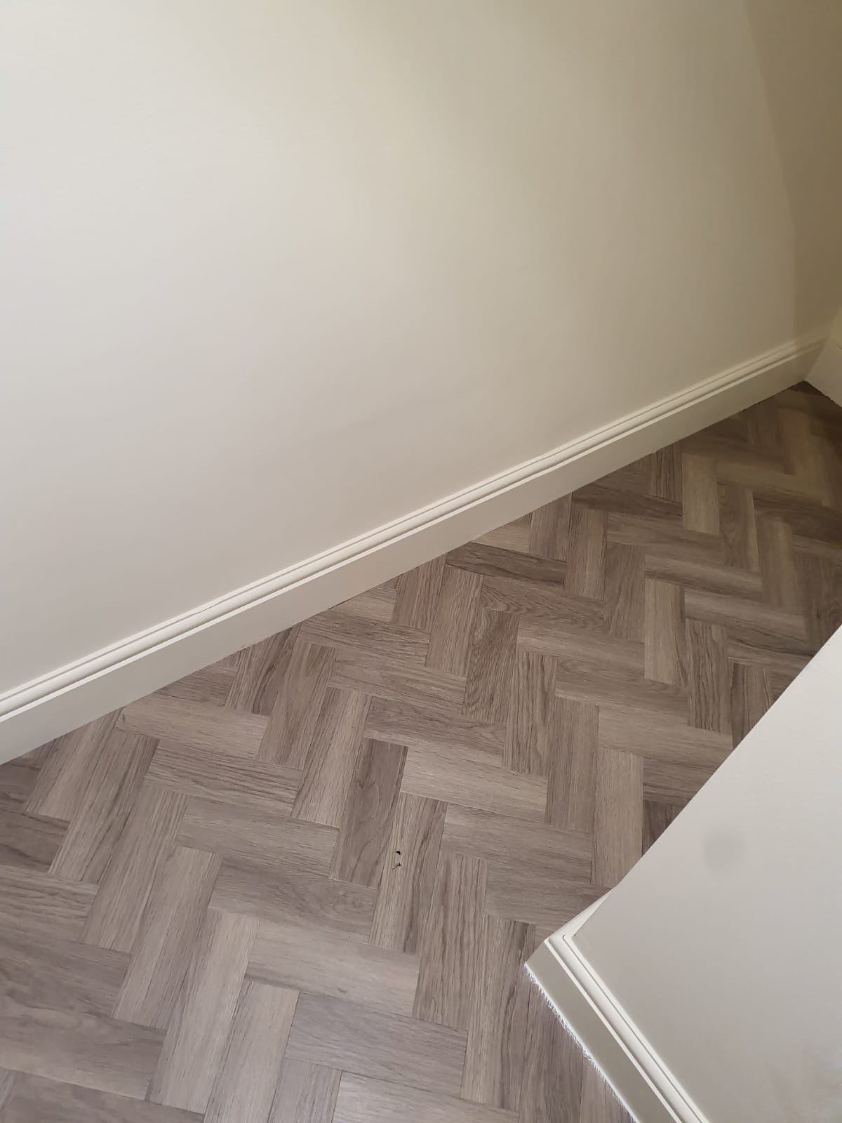 Amtico Spacia Nordic Oak in Herringbone Design to Premises 13