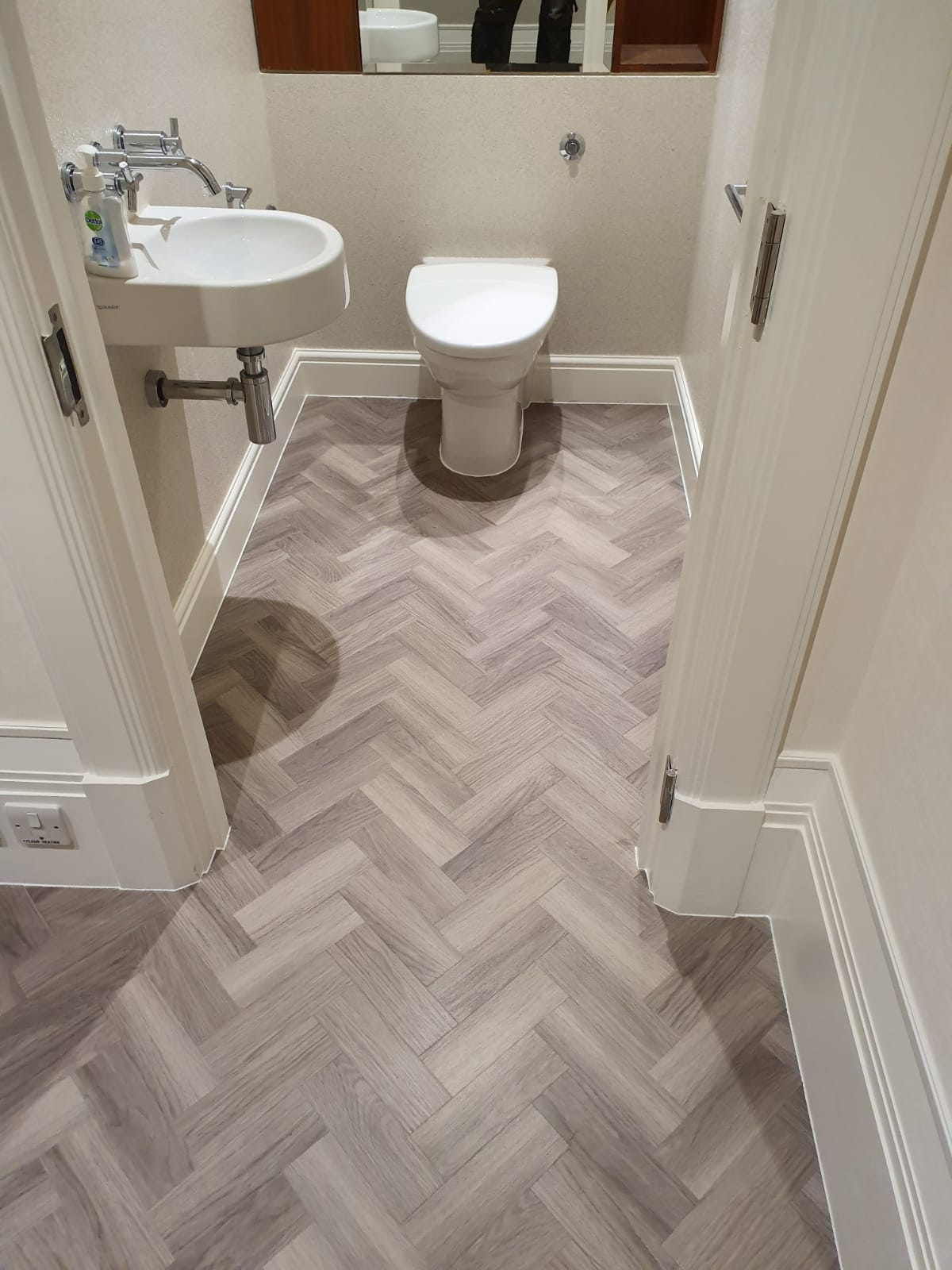 Amtico Spacia Nordic Oak in Herringbone Design to Premises 21