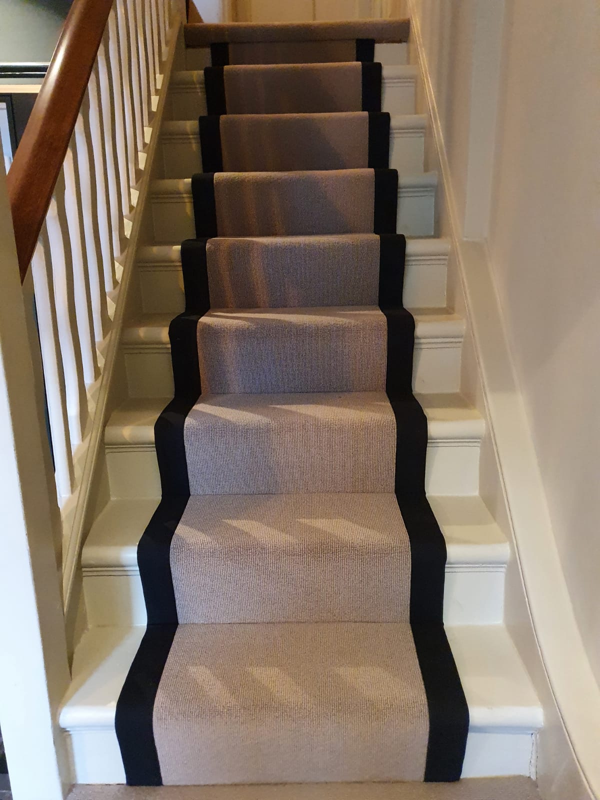Pink Carpet with Black Binding In Kensington 1