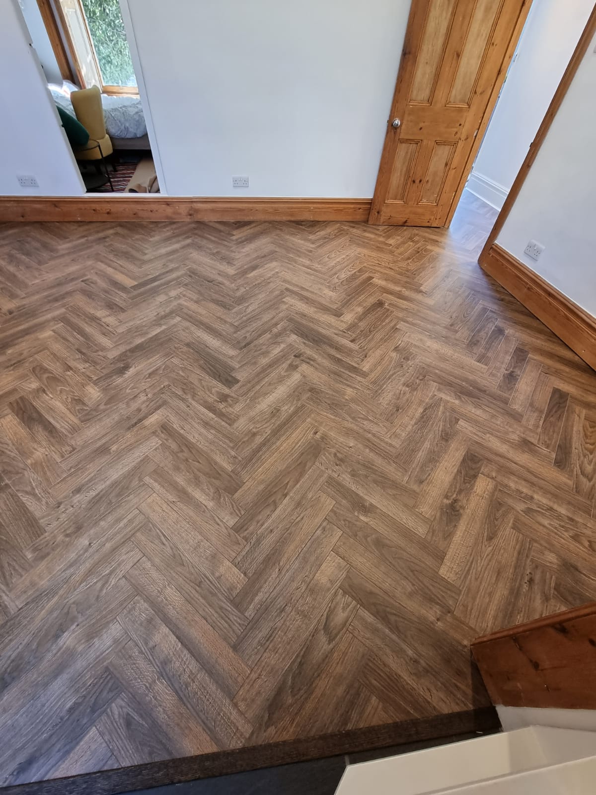 Xylo Urban Herringbone San Francisco Java Brown Laminate Flooring 1