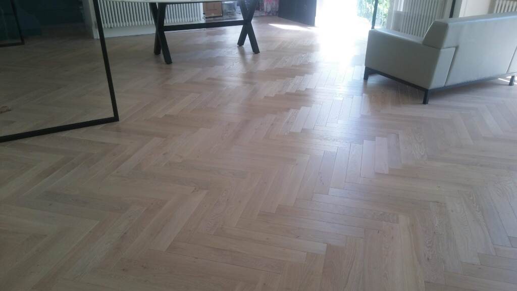 Panaget Herringbone Oil Tufeau Installation in Canary Wharf, Wood Flooring, Home