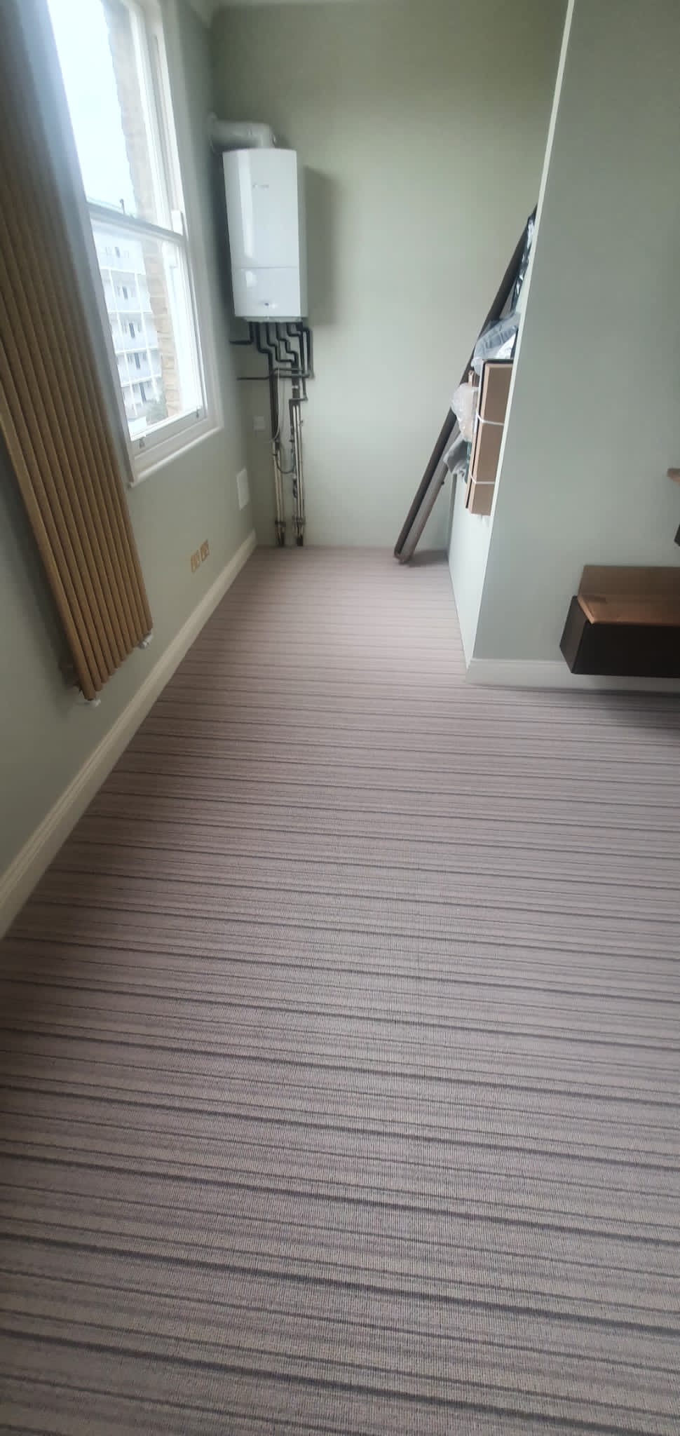 Hugh Mackay Carpets Deco Stripe Mayfair installation in Camden-1