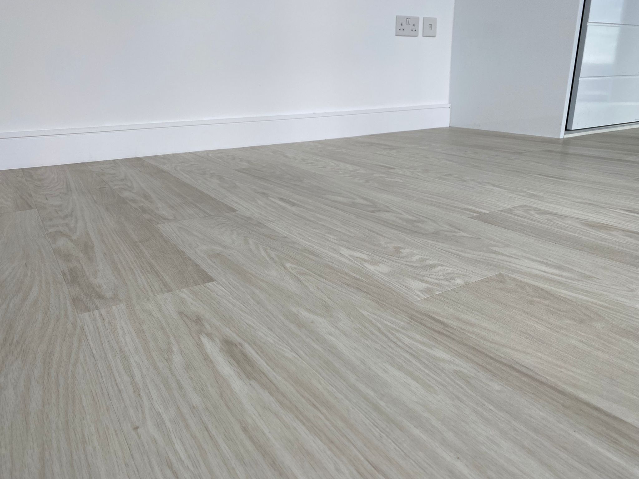 Amtico Spacia White Oak Installation in Wimbledon Wood Flooring - Amtico Flooring - Residential