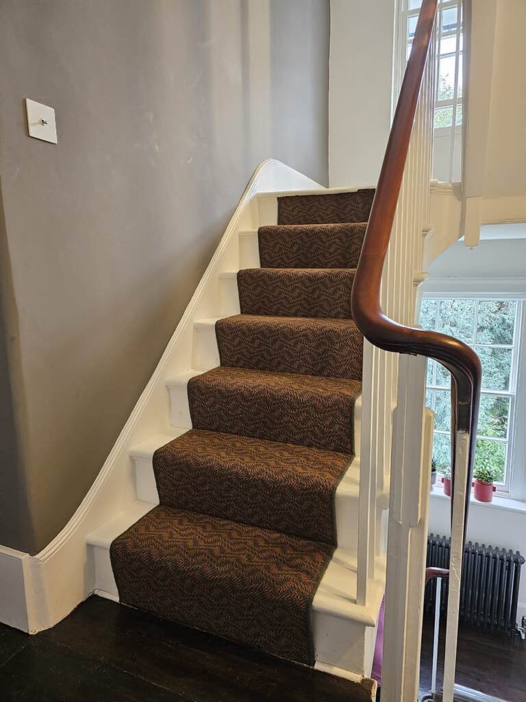 Crucial Trading Enigma Eternal Flame Carpet Installation in Camden, Home