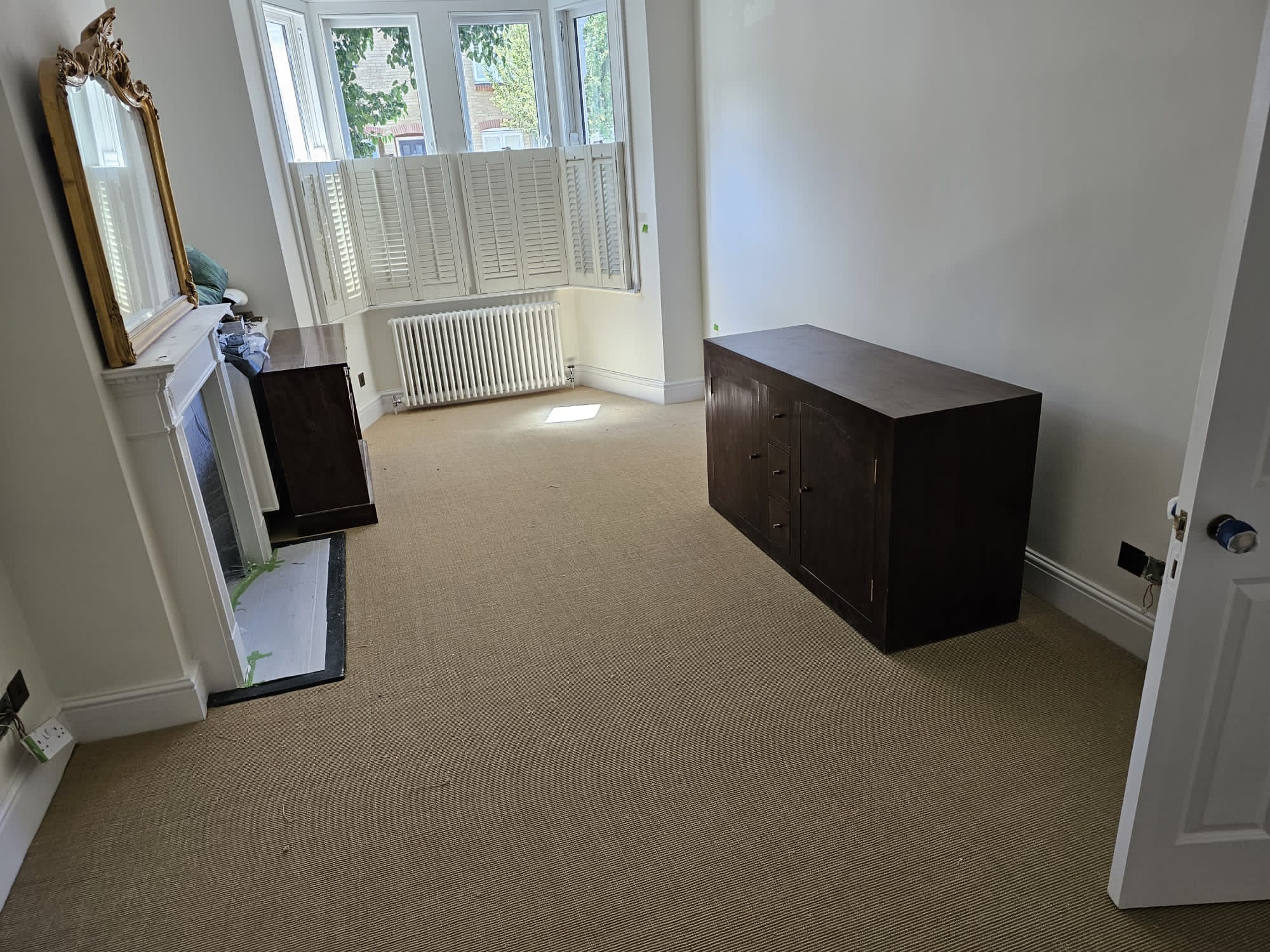 Crucial Trading Harmony Boucle Light Caramel carpet installation in Knightsbridge-1