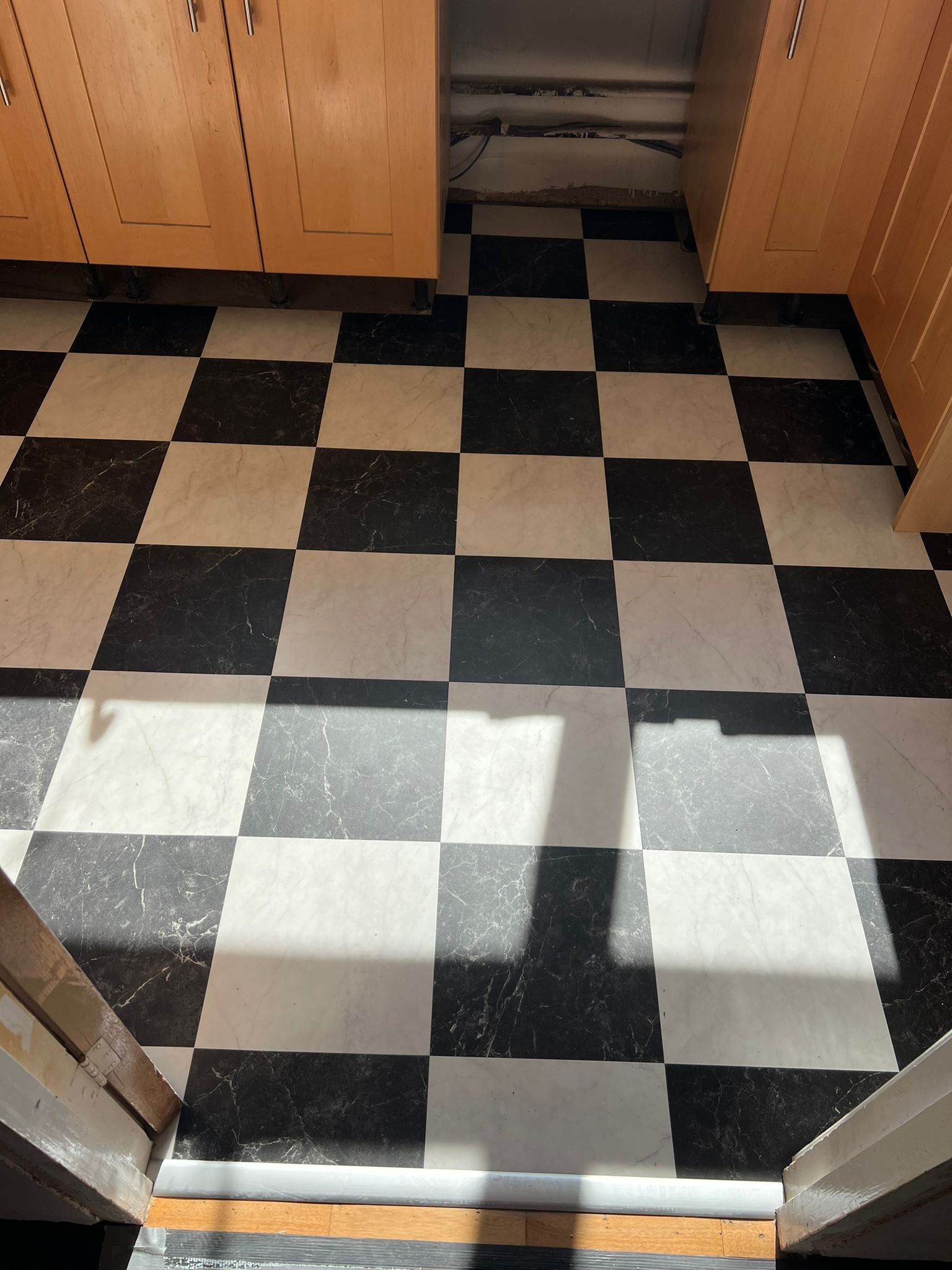 Amtico Signature Bianca Classic Marble & Nero Marble installation in Kensington-0