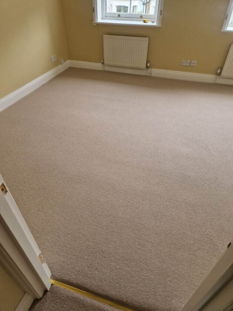 Hugh Mackay Carpets Deco Plains Putty installation in-main